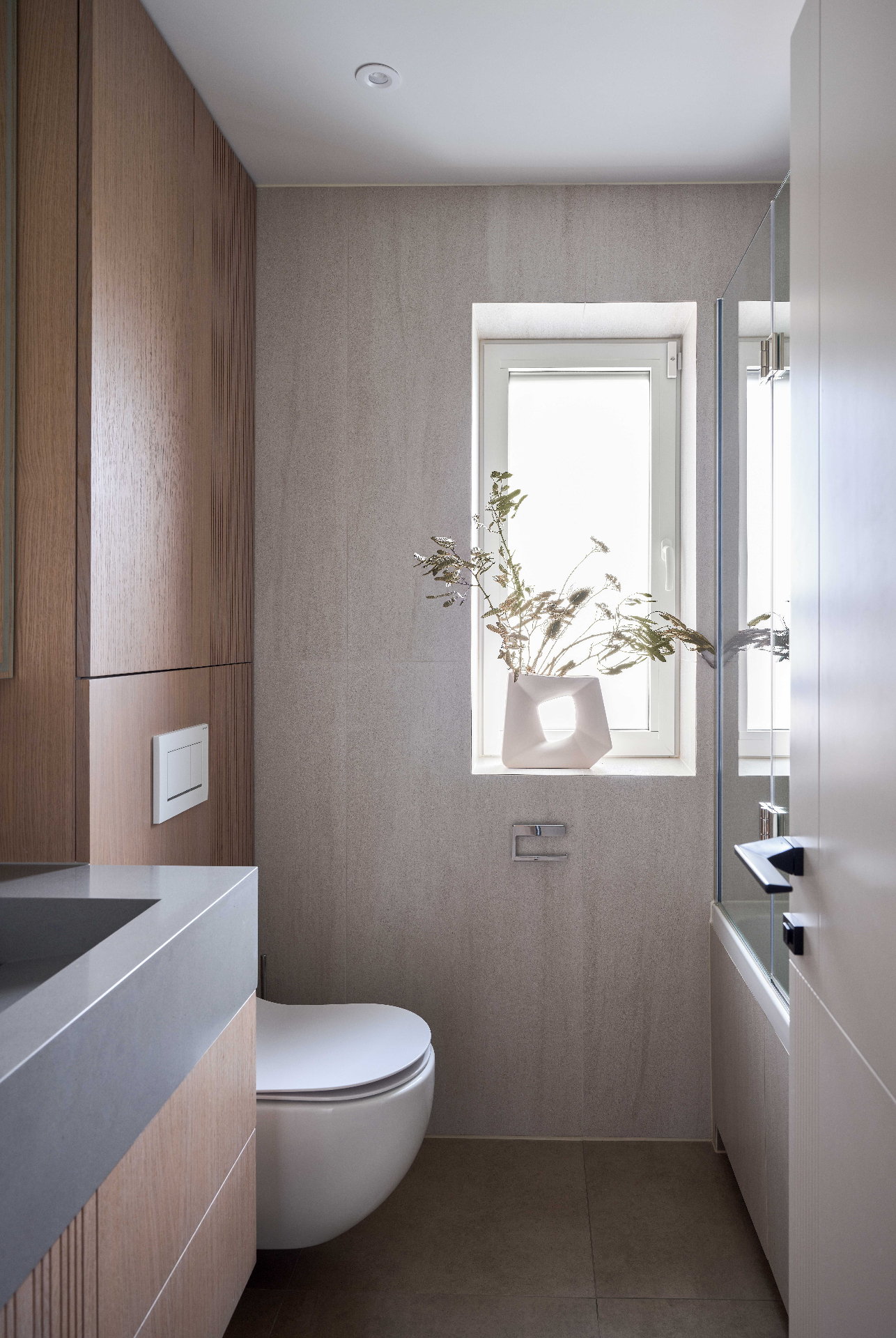 Stone & Oak Bath — contemporary bathroom with fluted oak vanity and grey quartz basin by Studio 32 — image 4